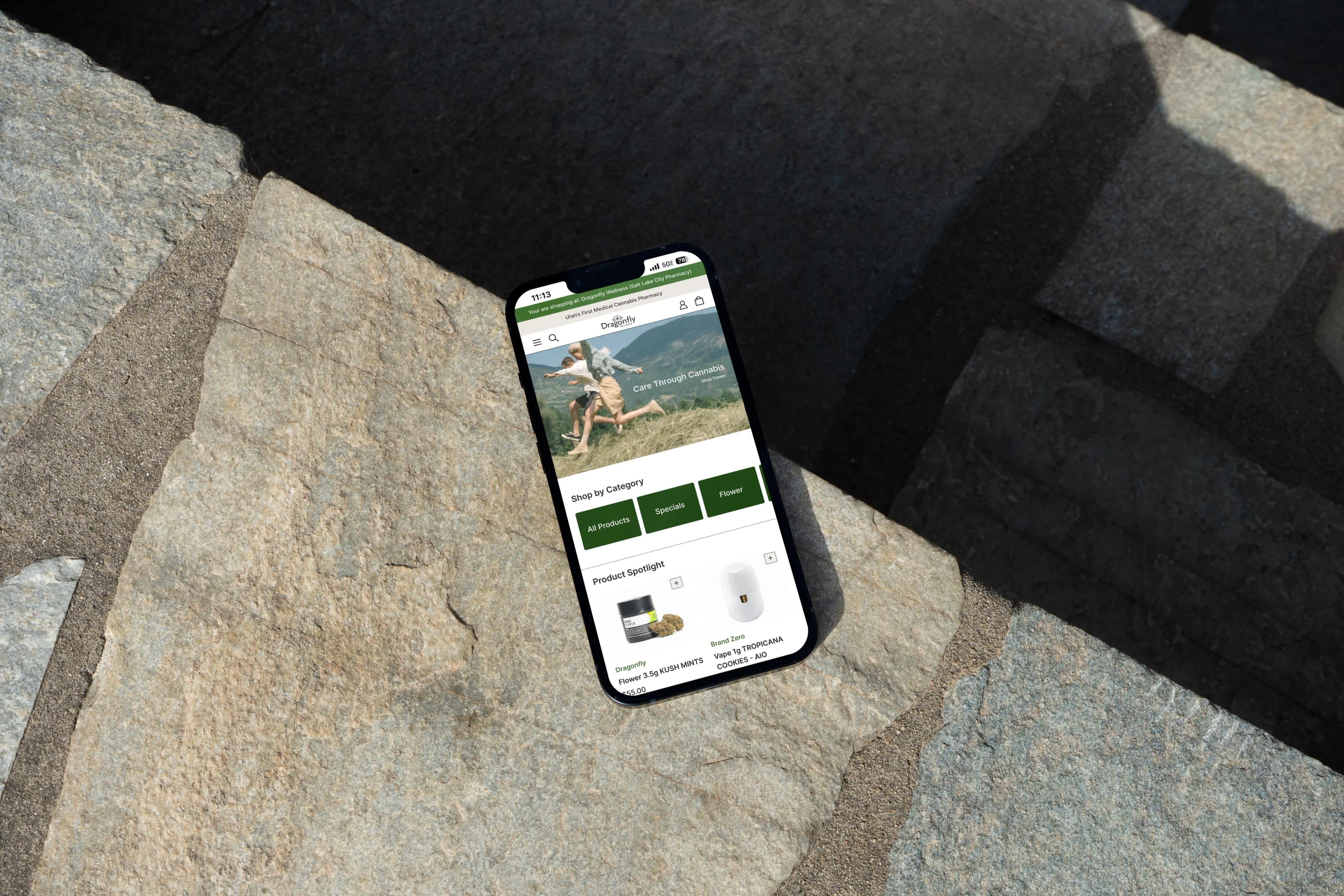 Smartphone laying on cobblestone