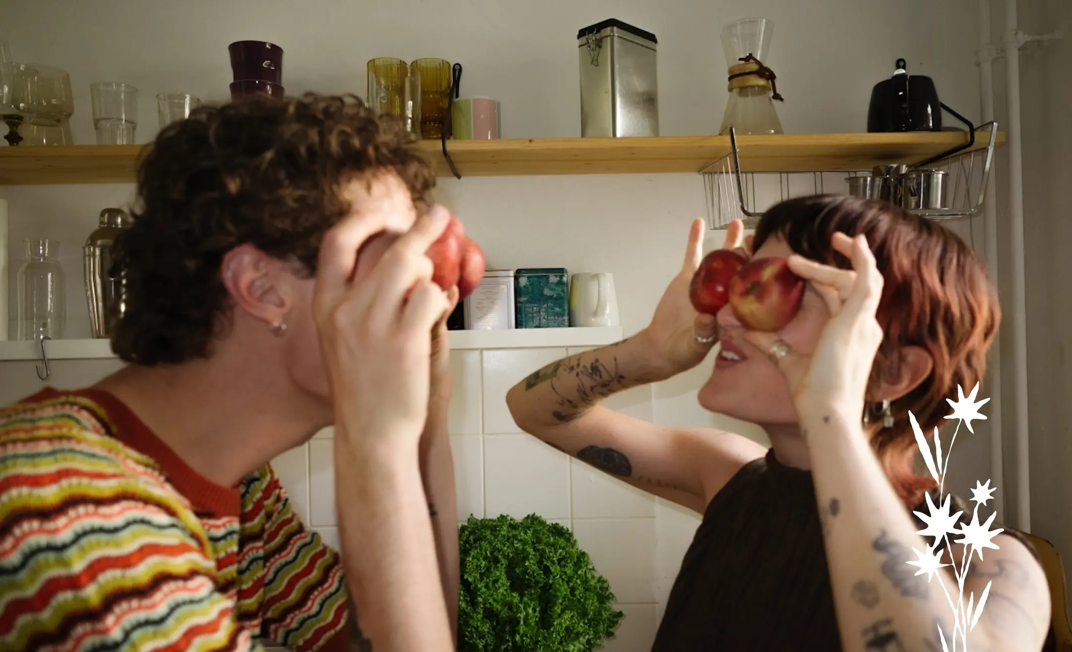 Two people in a kitchen